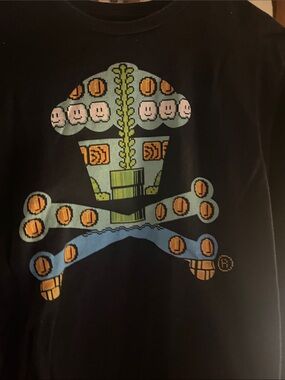 Johnny Cupcakes Black Tee with Multicolor Pixel Skull & Crossbones